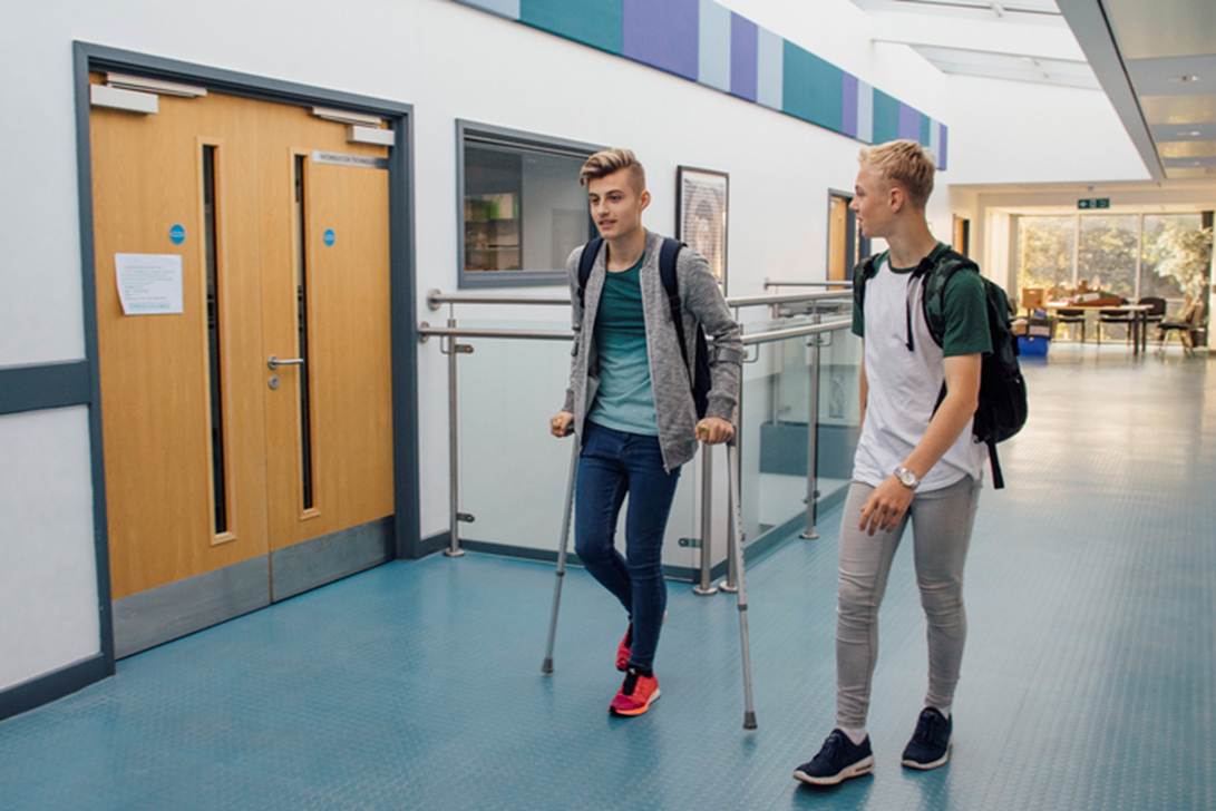 A group of people walking in a hallway
AI-generated content may be incorrect.